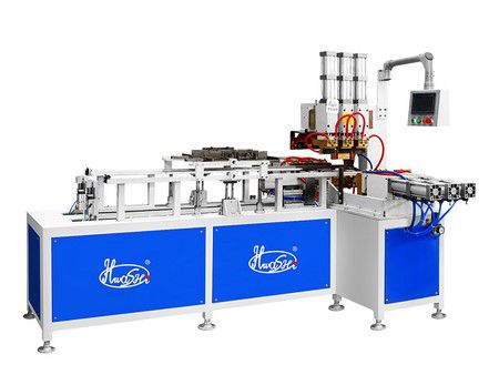 Automatic multi-head spot welder for wok rack