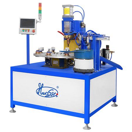 Automatic multi-station turntable spot welder for nuts