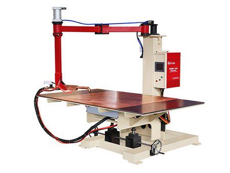 Movable arm table spot welding machine